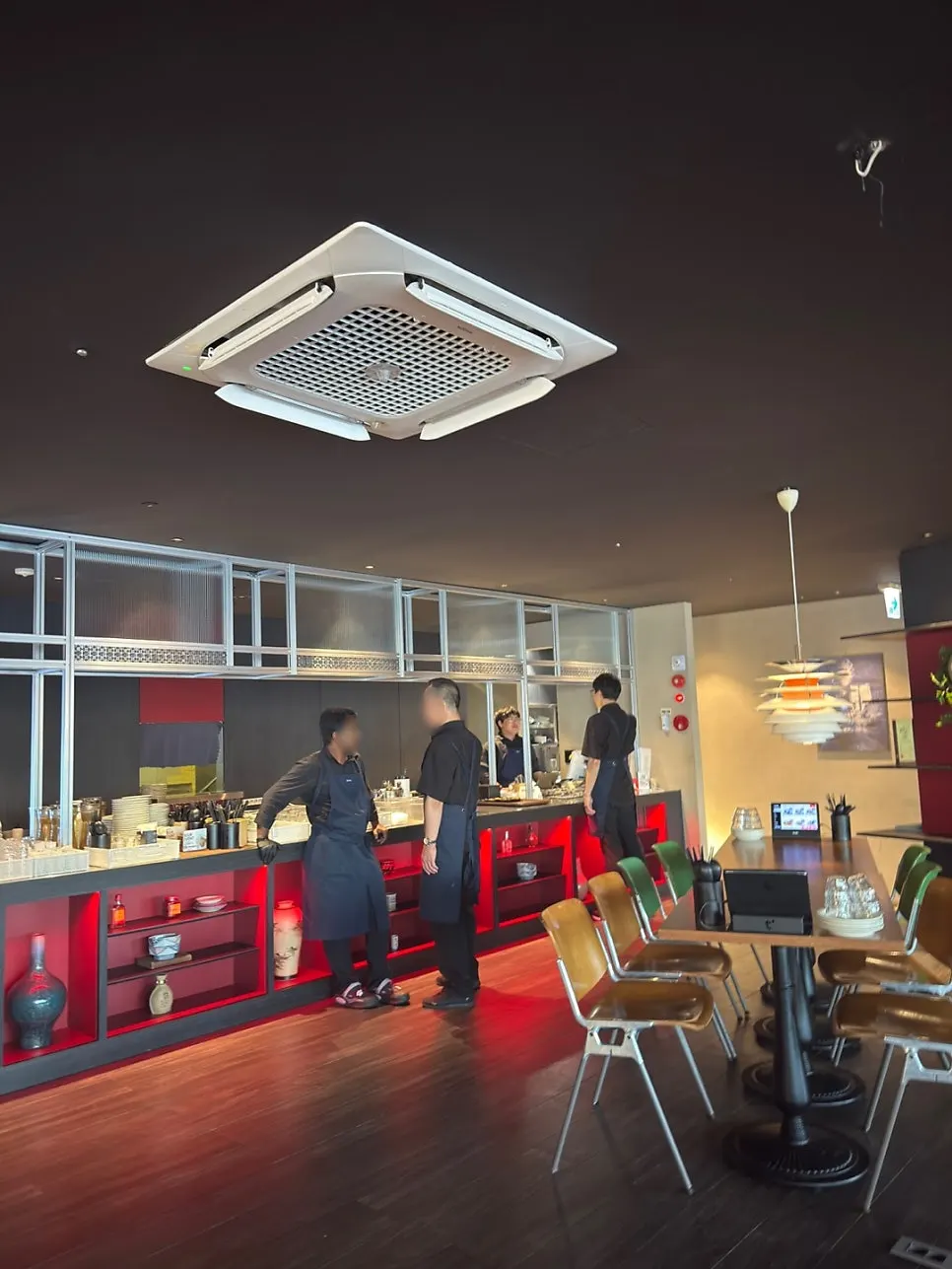 Interior of the Chinese restaurant hall with lighting turned on