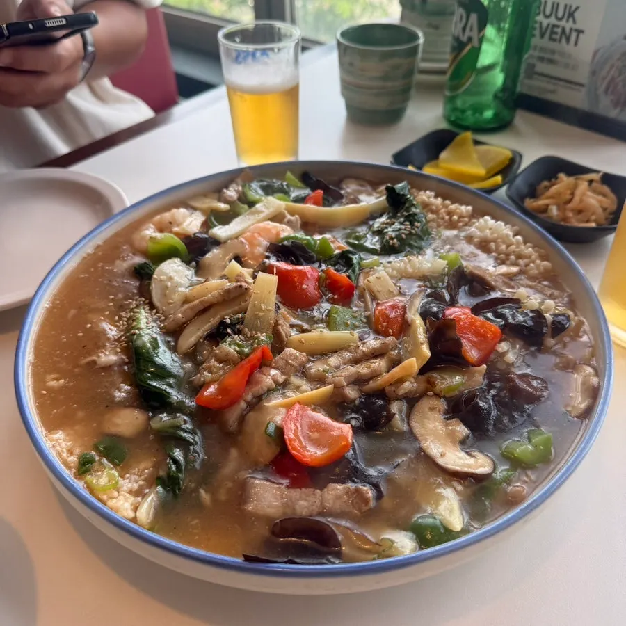 Broth and scorched rice in the seafood nurungji soup