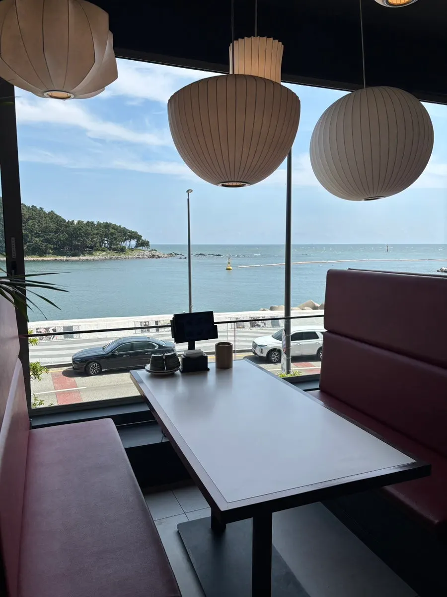 Window seating with ocean view outside