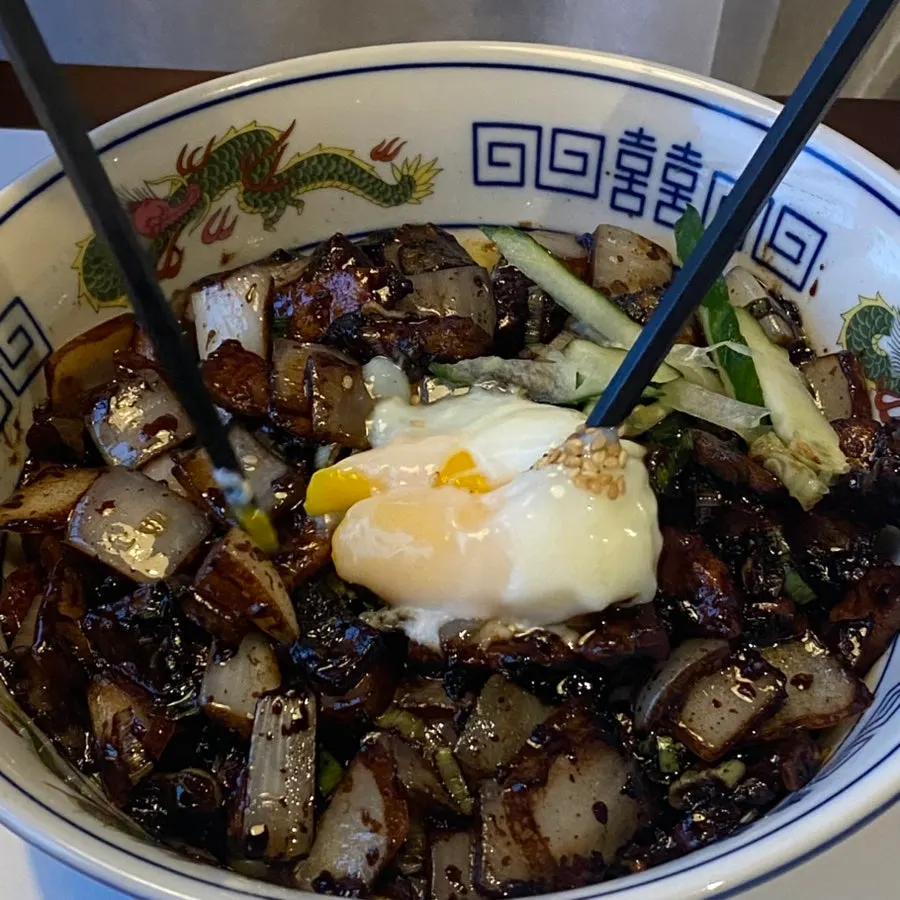 Jjajang sauce loaded with pork belly and onion