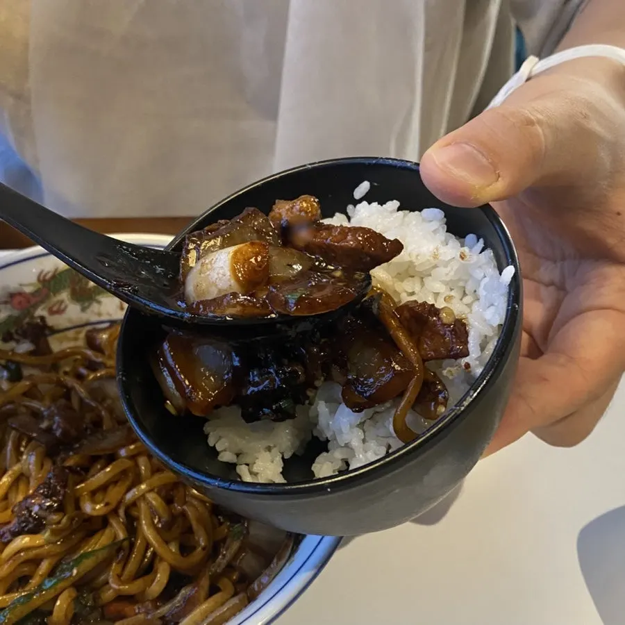 Leftover pork belly, onion and jjajang sauce after finishing the noodles