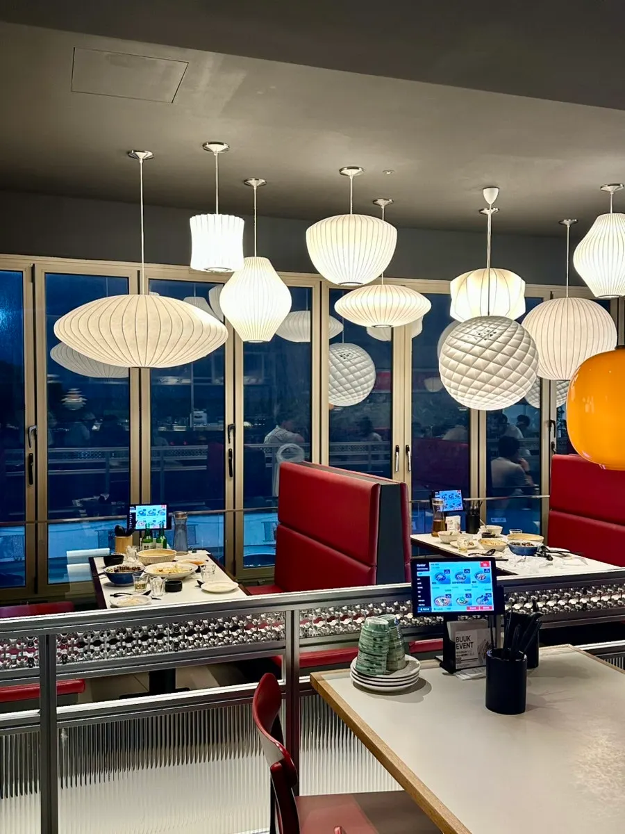 Restaurant interior with ceiling lighting