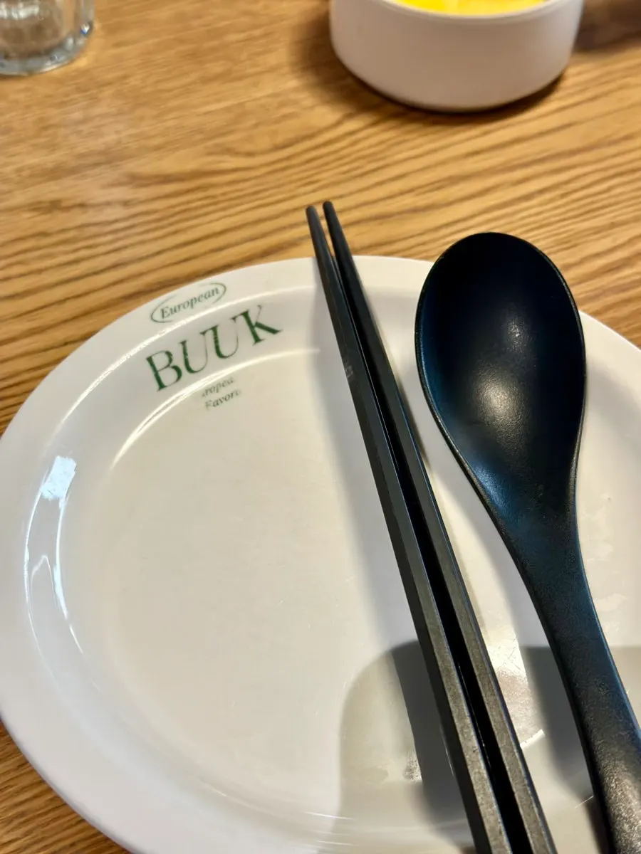 Table set with utensils and basic side dishes