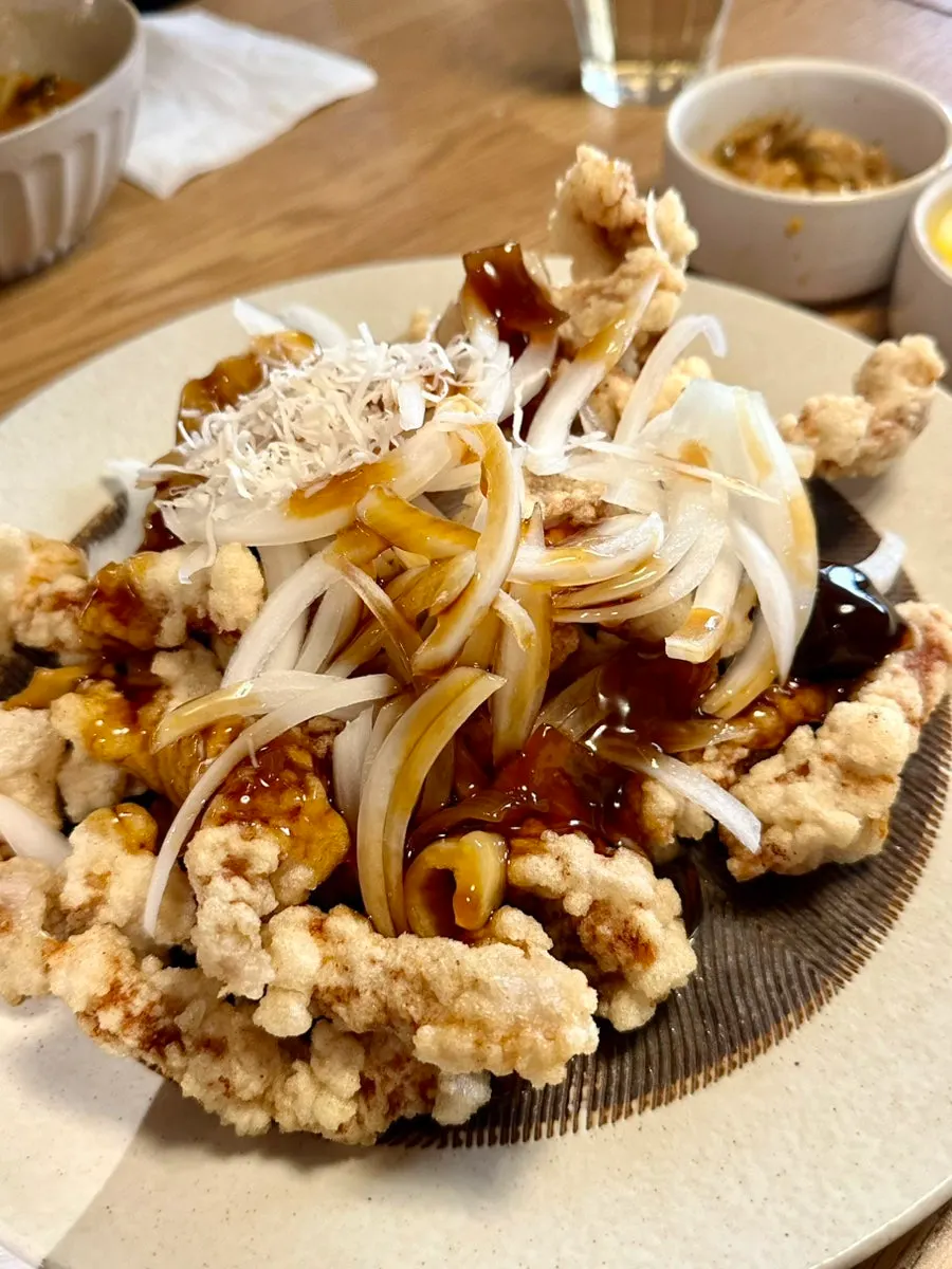 Black vinegar tenderloin tangsuyuk served with sauce poured on top