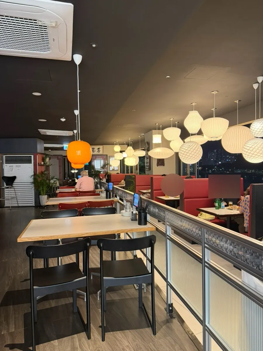 Upscale red-and-black toned interior of the Chinese restaurant