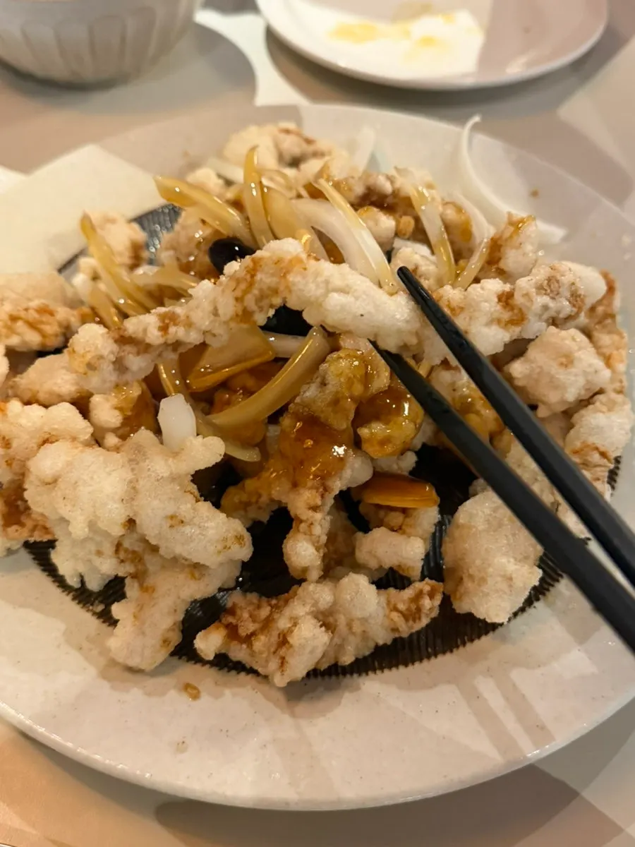 Close-up of tenderloin tangsuyuk tossed in black vinegar sauce