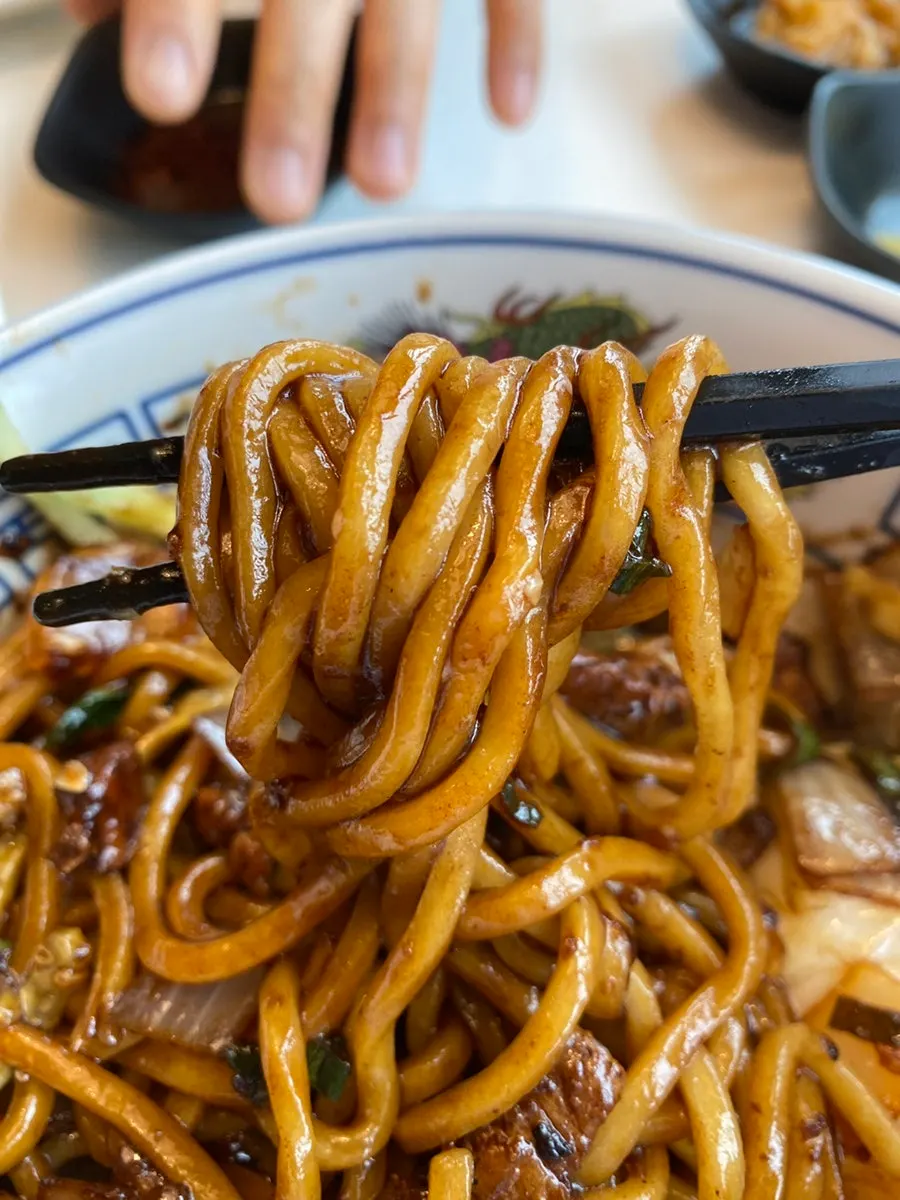 Close-up of the poached egg on top of the ganjajang