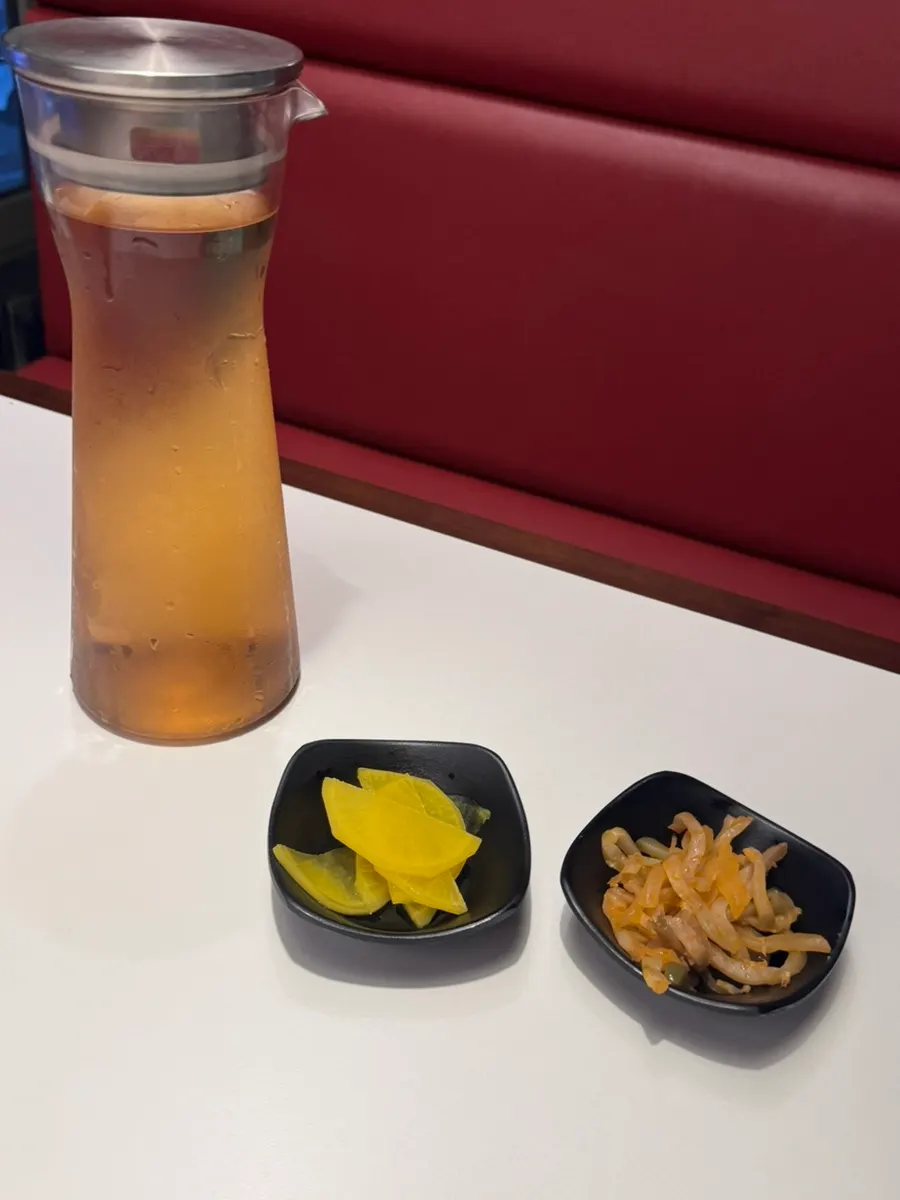 Basic side dishes: barley tea, danmuji, and jachai