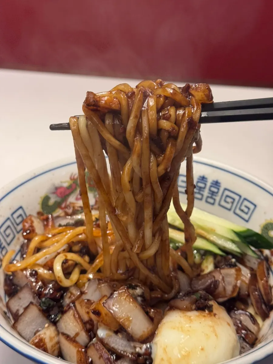 Bueokgan Chinese's poached-egg jjajangmyeon with egg on top