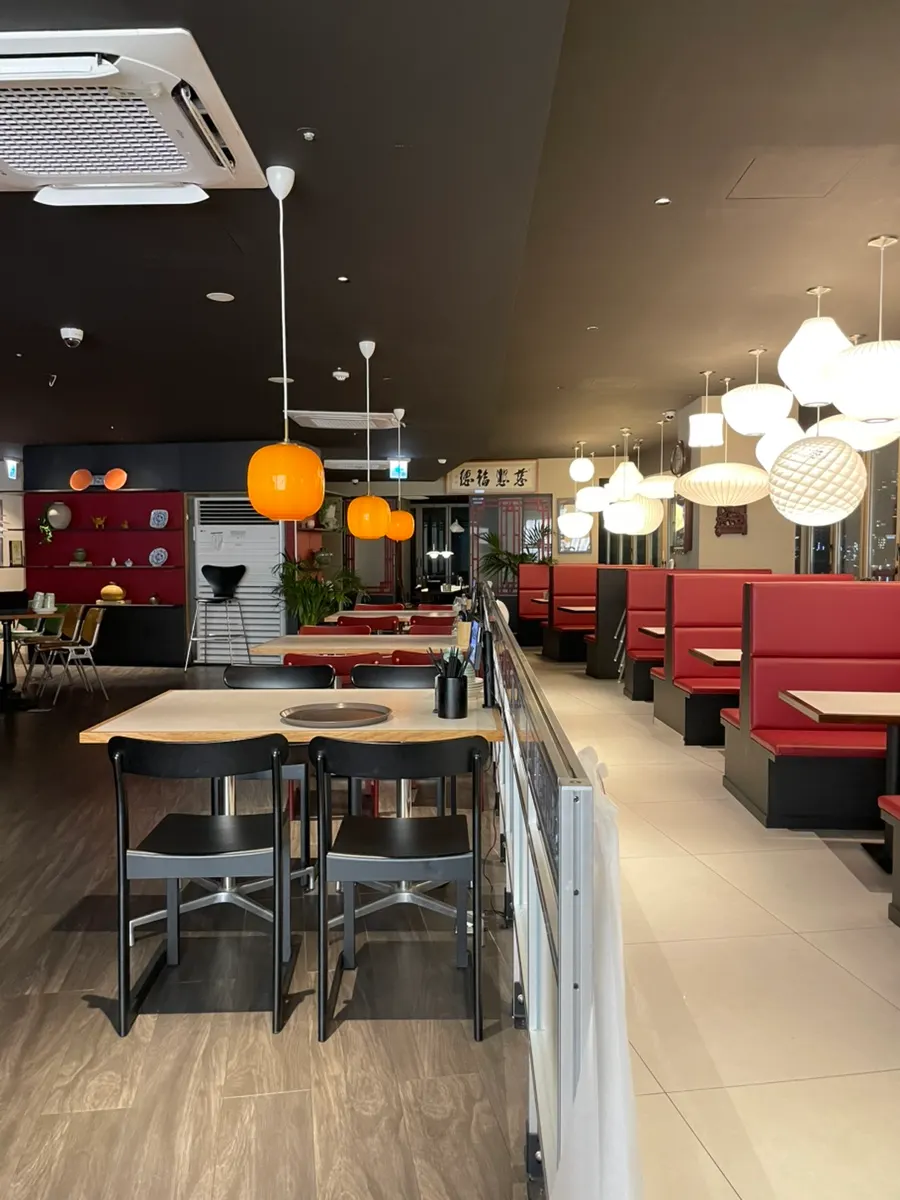 Aisle and seating inside the Chinese restaurant