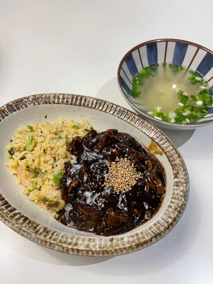 A bowl of seafood jjamppong made with thick noodles