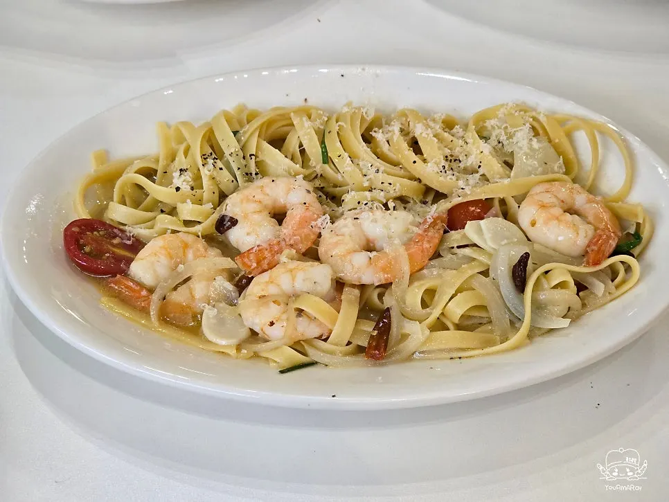 Shrimp anchovy pasta topped with plump shrimp