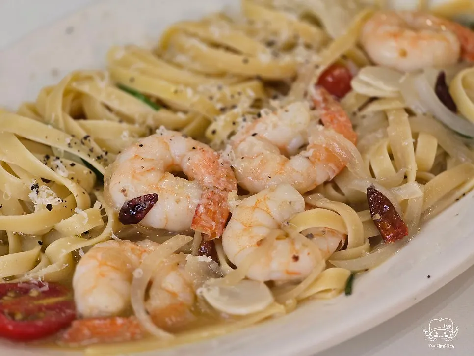 Plate of shrimp anchovy pasta at a Yangsan date spot