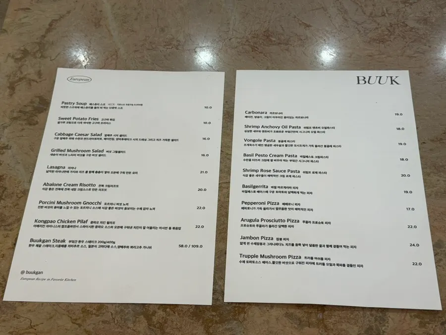 Menu page listing pasta and pizza dishes at Bueokgan