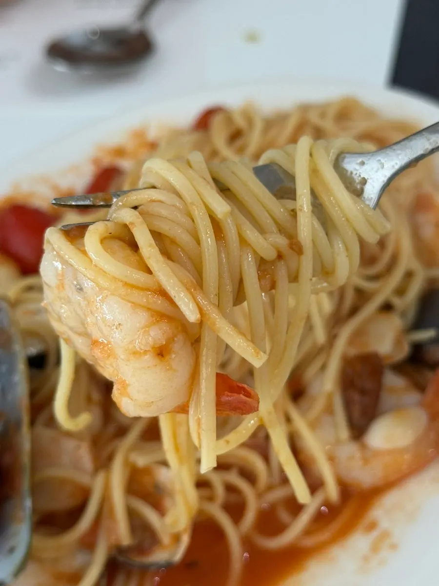 Close-up of the tomato sauce seafood pasta