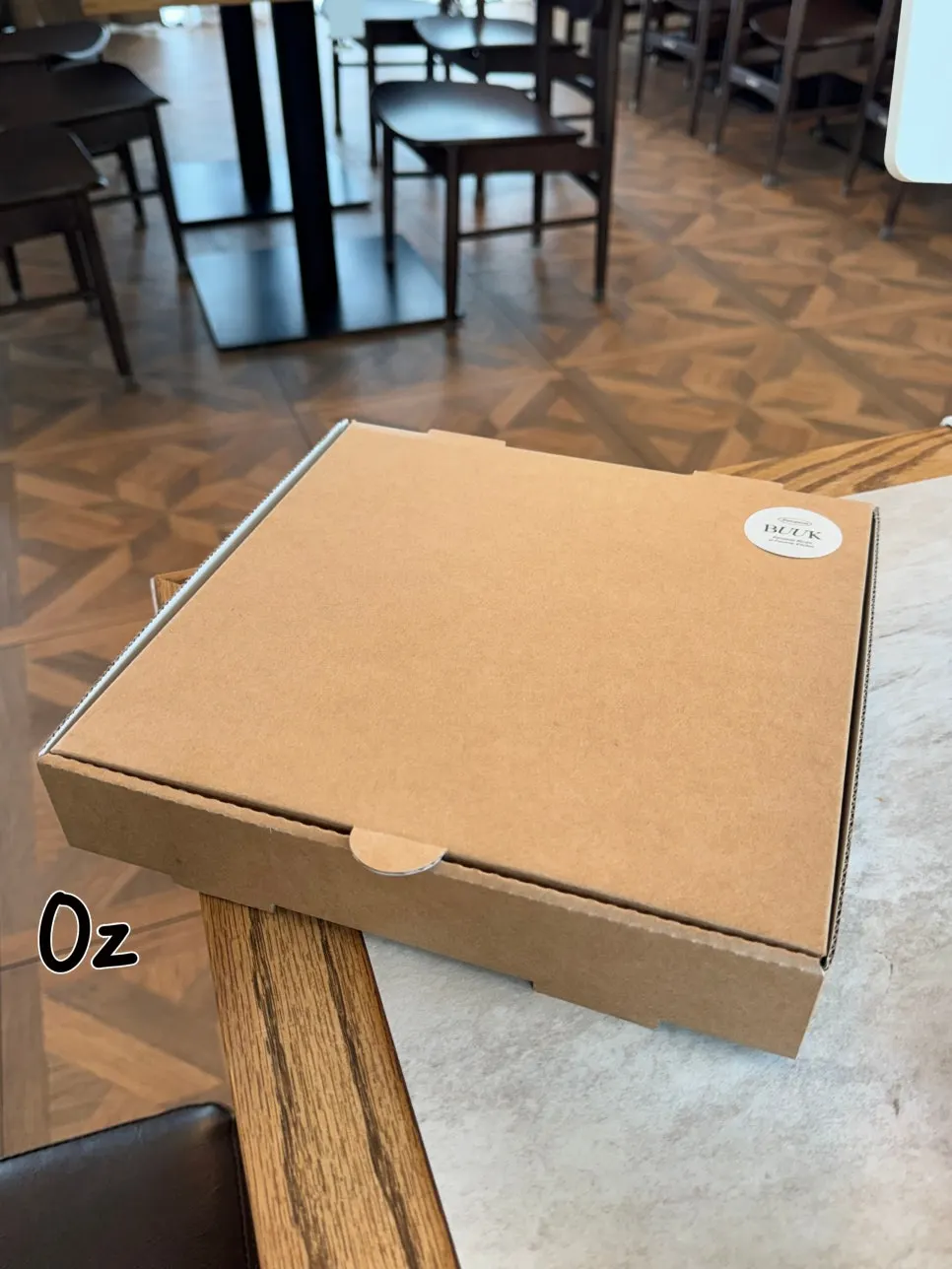 Leftover pizza packed in a takeout box