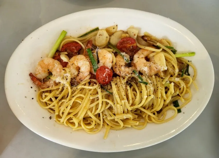 A plate of shrimp anchovy oil pasta