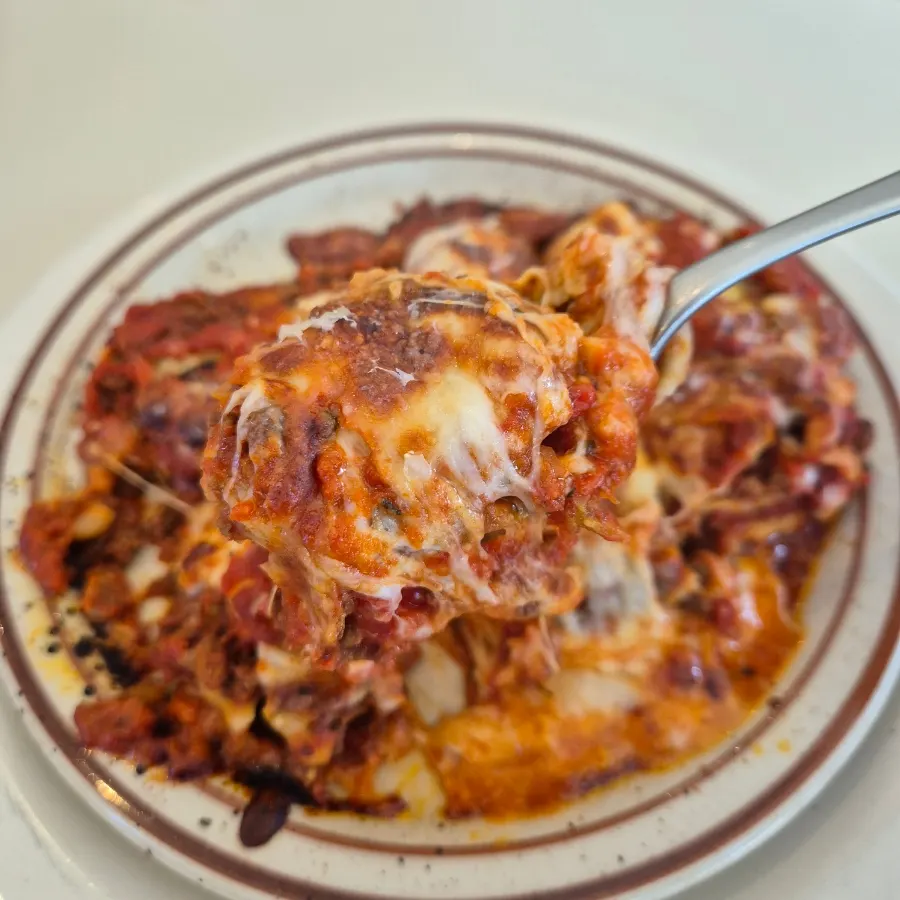 Cross-section of lasagna layered with eggplant and meat sauce