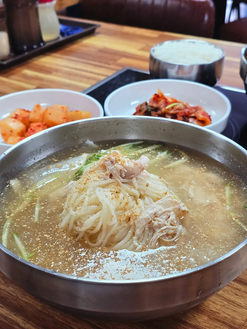 A bowl of chogyeguksu topped with icy slush