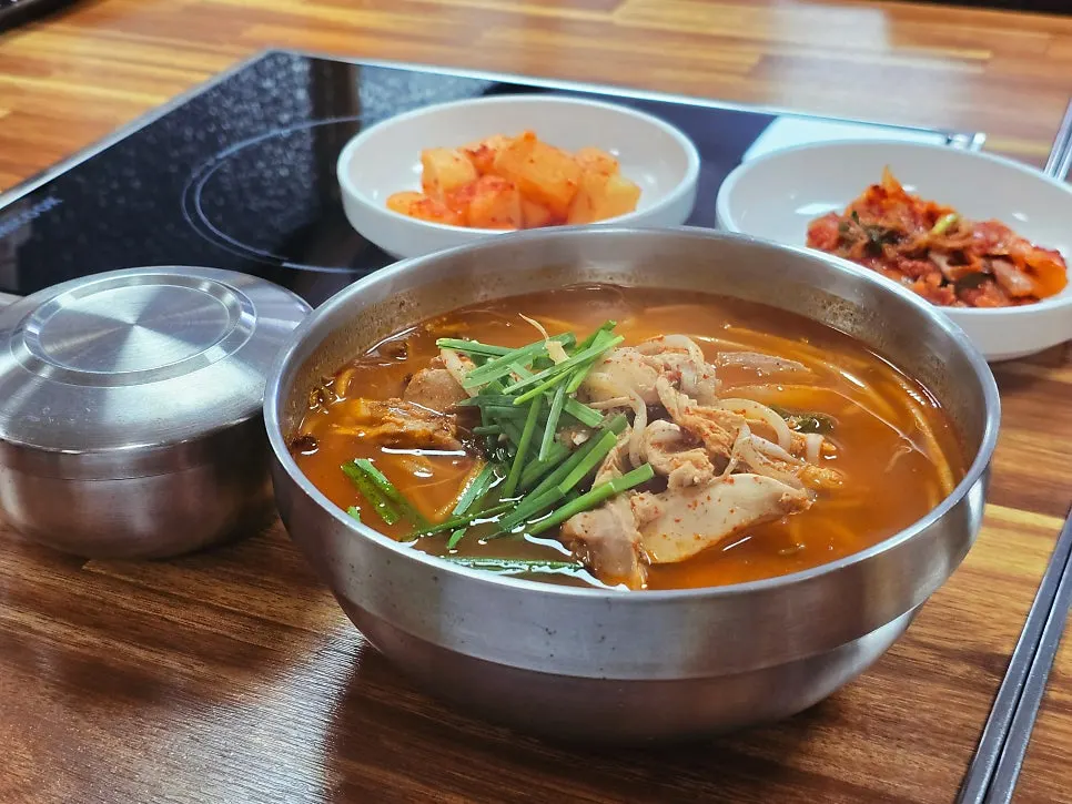 Chogyeguksu noodles lifted with chopsticks