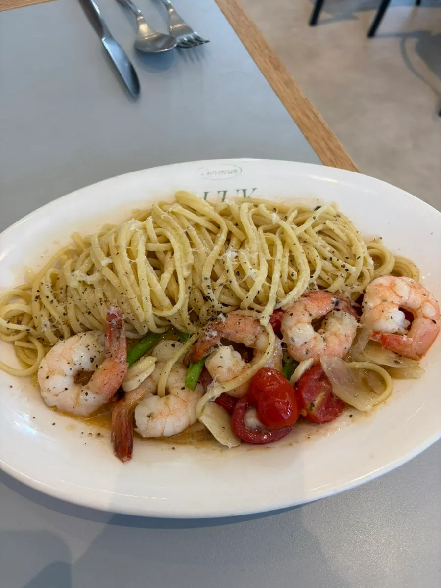 A plate of shrimp anchovy oil pasta