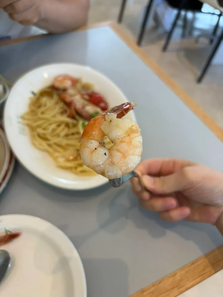 Oil pasta showing plump shrimp