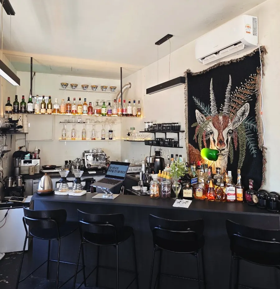 The bar area with coffee equipment and cocktail liquors