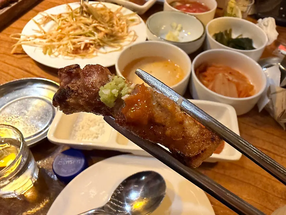 Golden-browned charcoal-grilled meat