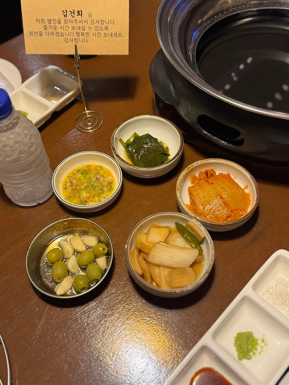 Basic side dish spread including olives and myeongi namul