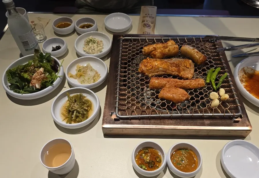 Grilling at Chodaechang, a yangdaechang restaurant in Byeollae