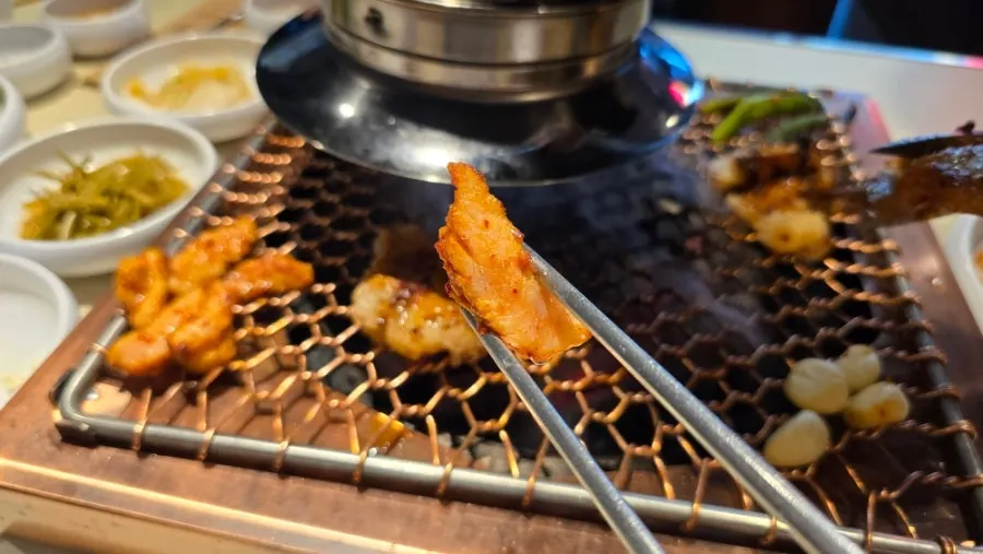 Grilled meat cut into bite-sized pieces and re-grilled