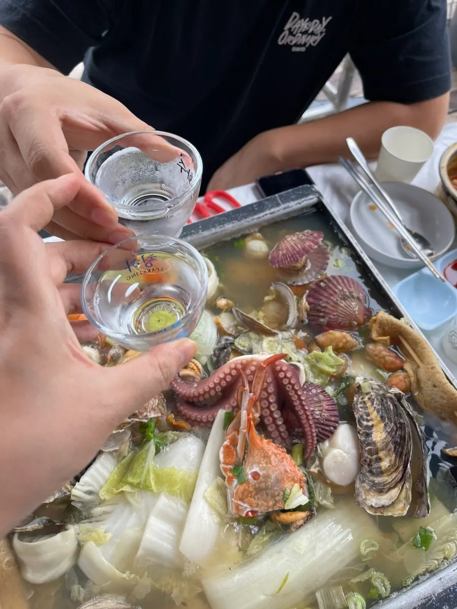 Bucket piled high with clam shells