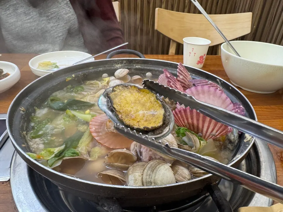 Hot broth blended with seafood flavor