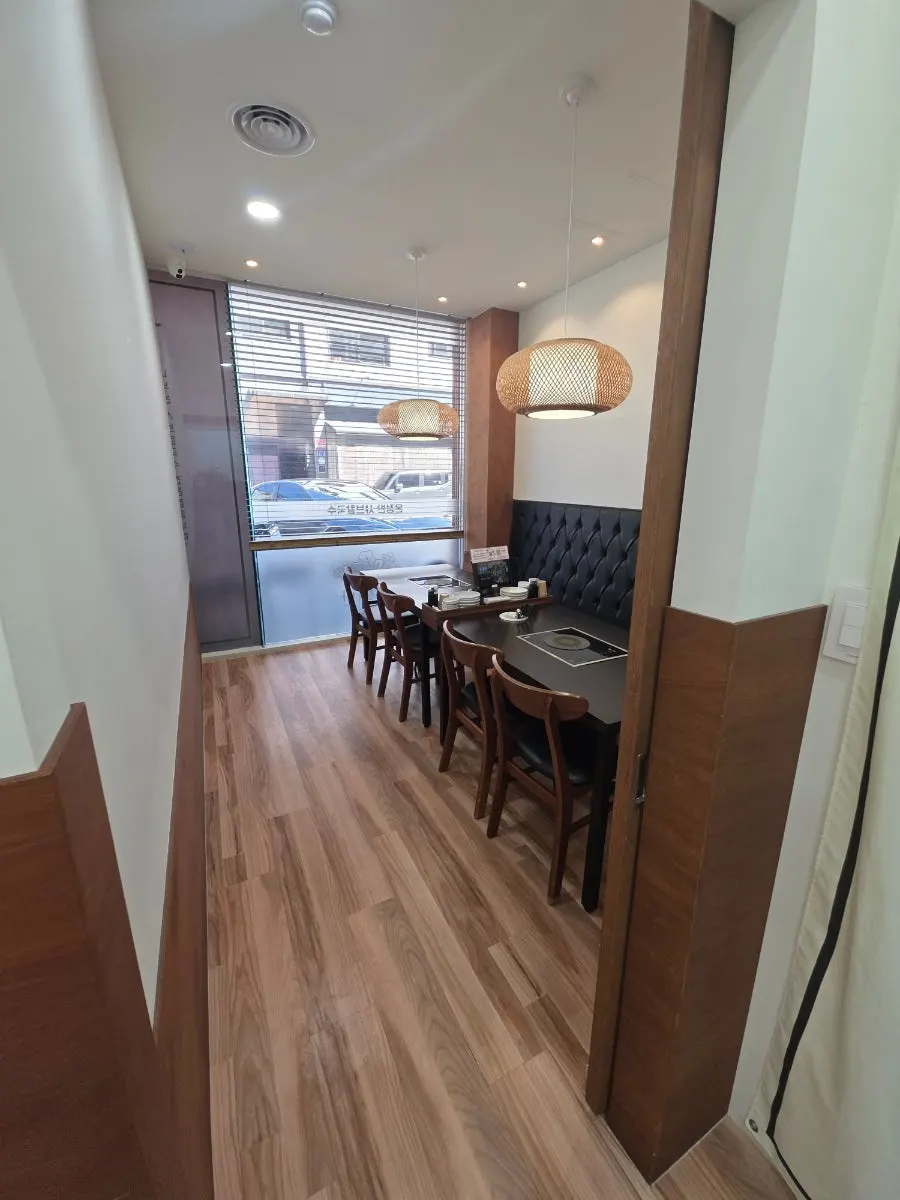 Bright, spacious interior seating at Onjeongban Shabu Kalguksu