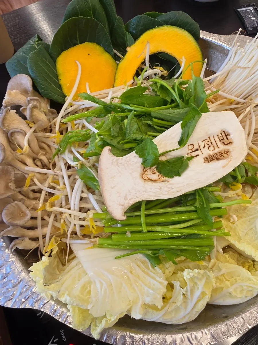 Shabu vegetables and beef simmering in the hot pot