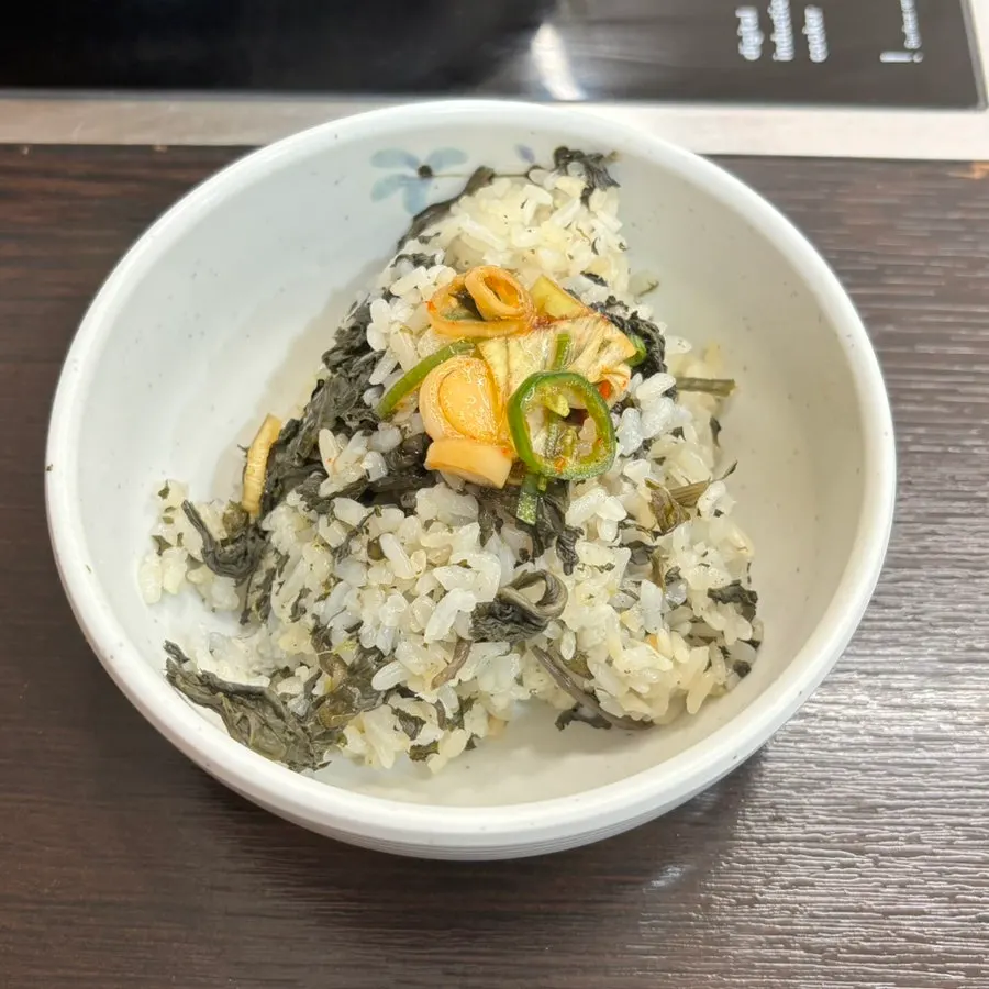 Self-service bar with gondre rice and side dishes
