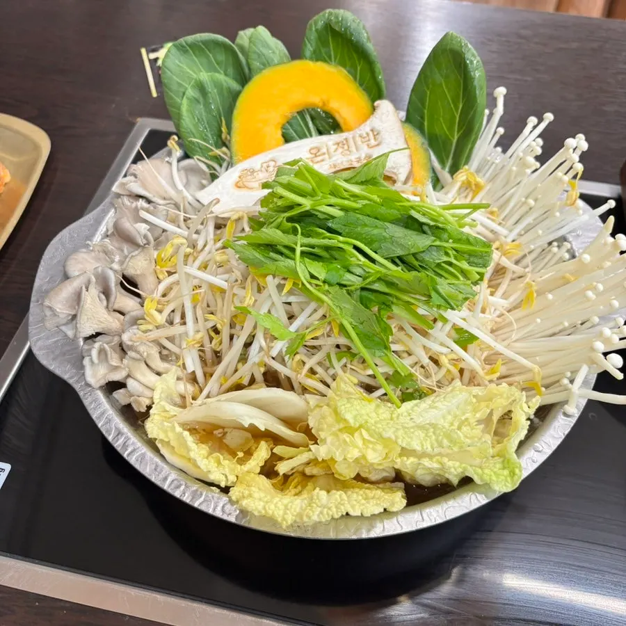 A full serving of handmade rolled-dumpling hot pot