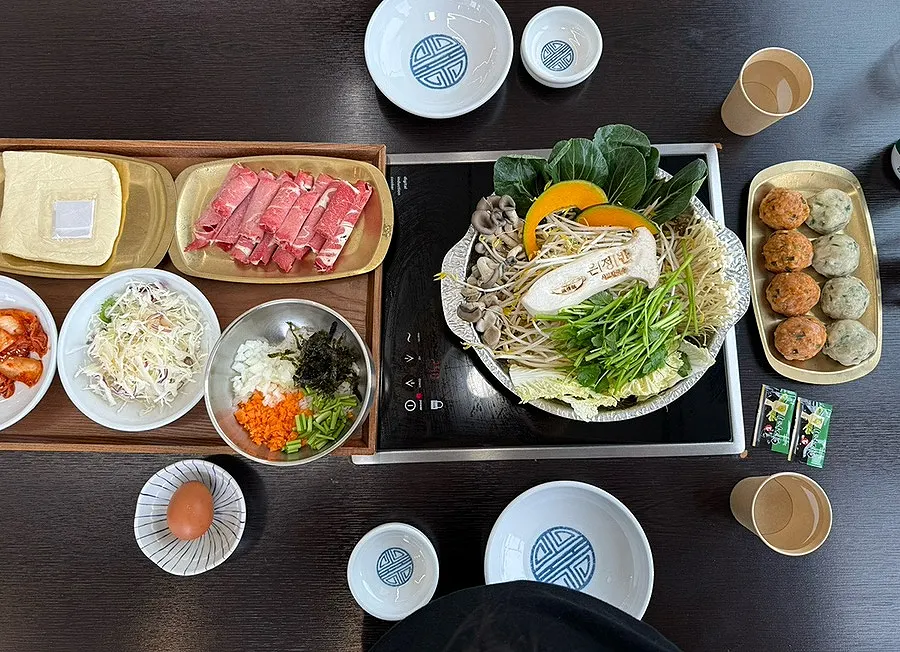 Two servings of Onjeongban self-serve shabu kalguksu