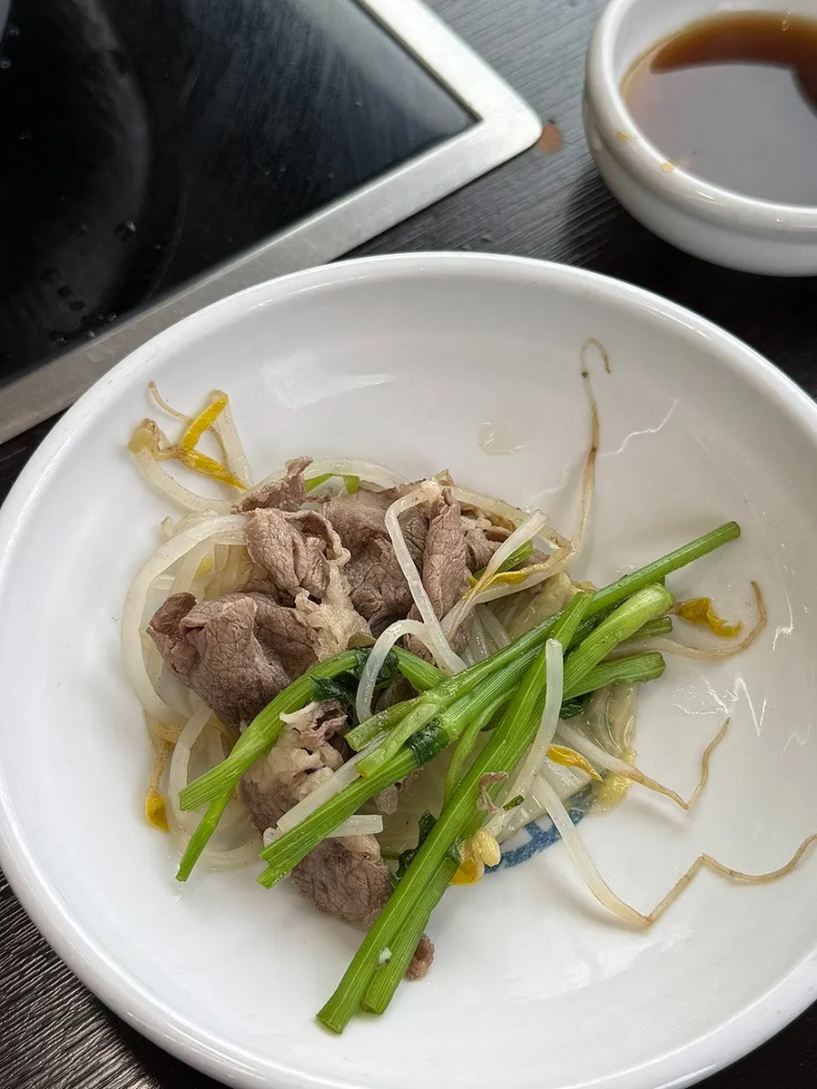 Shabu beef cooking with vegetables