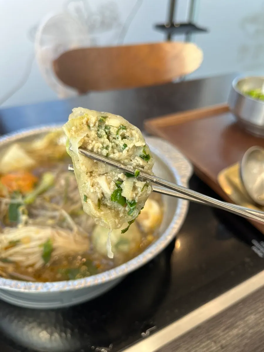 Two kinds of rolled dumplings, kimchi and meat