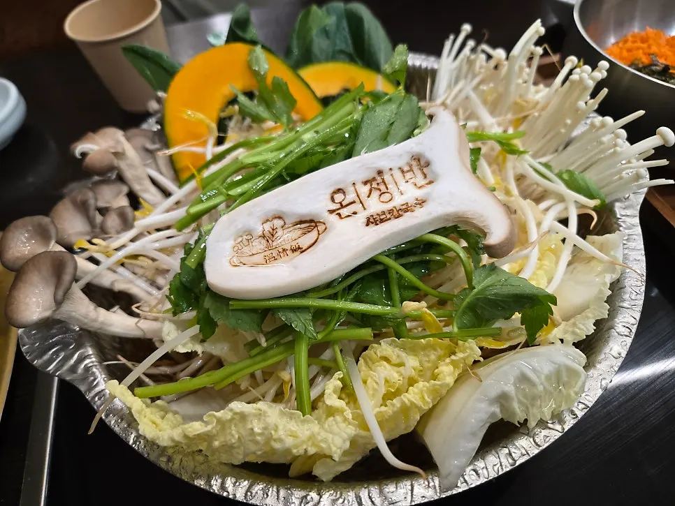 Full spread of shabu kalguksu for two in clear broth