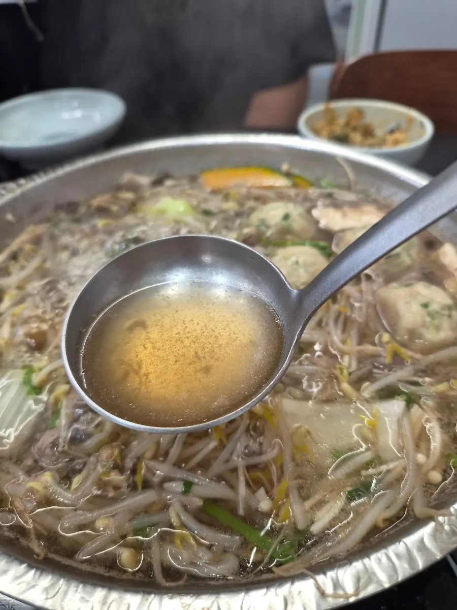 Mushrooms and vegetables simmering in the broth