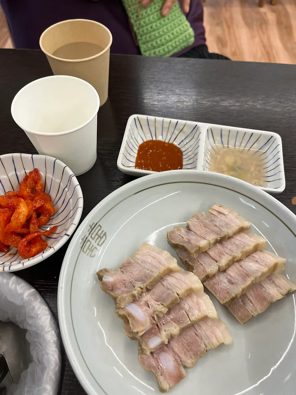 Boiled pork plate served with salted shrimp and pickled radish strips