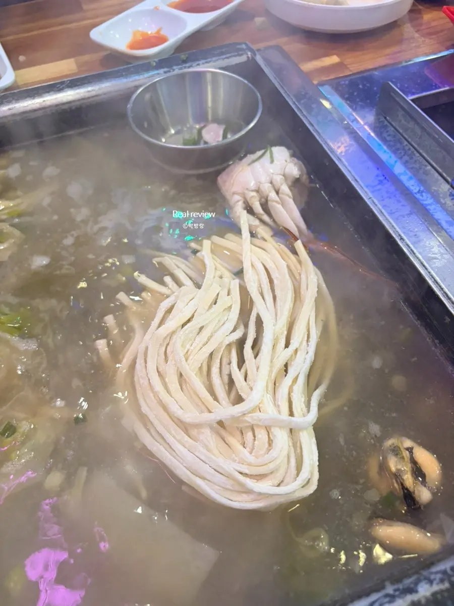 조개찜에 들어 있는 만두