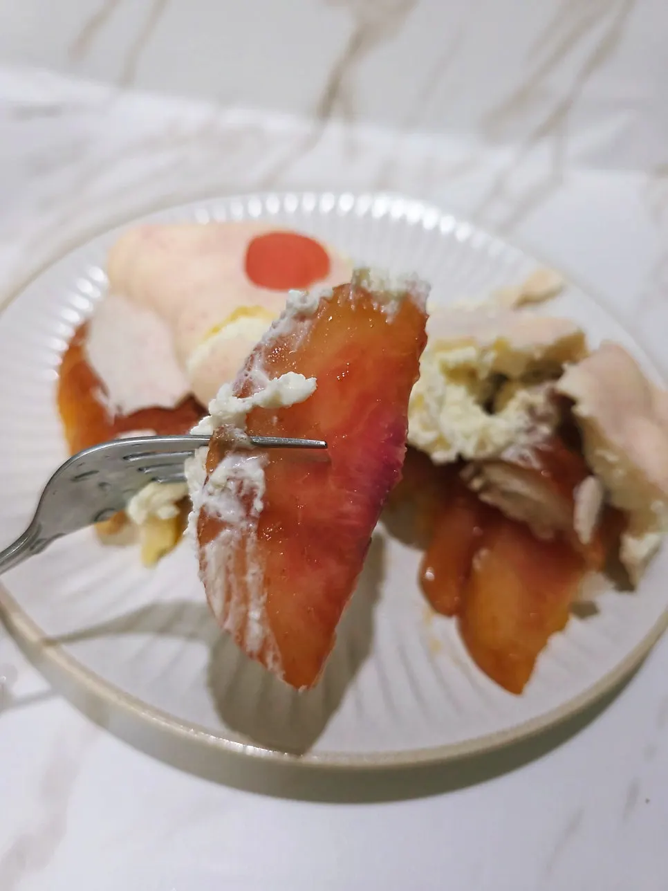 Cross-section of salt bread filled with peach