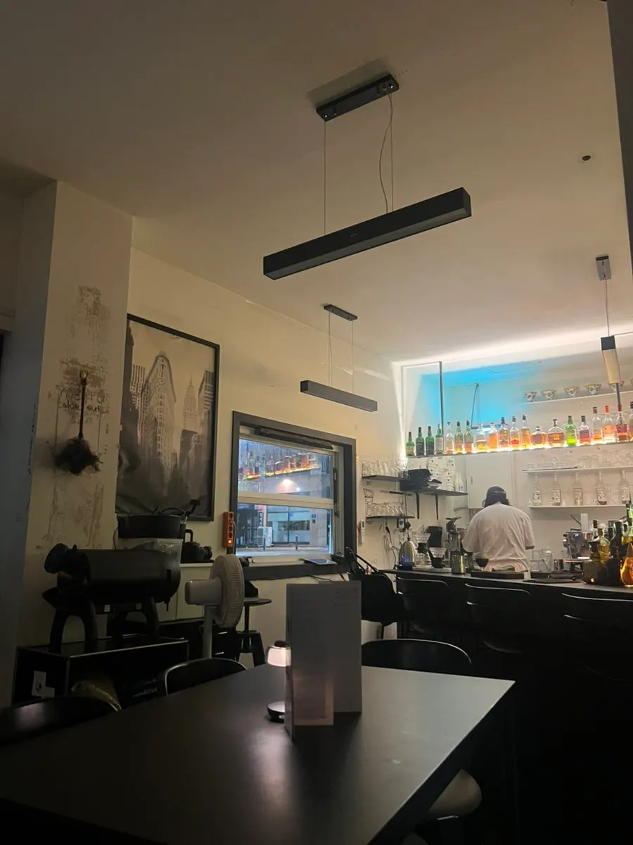 Evening coffee bar space with soft lighting