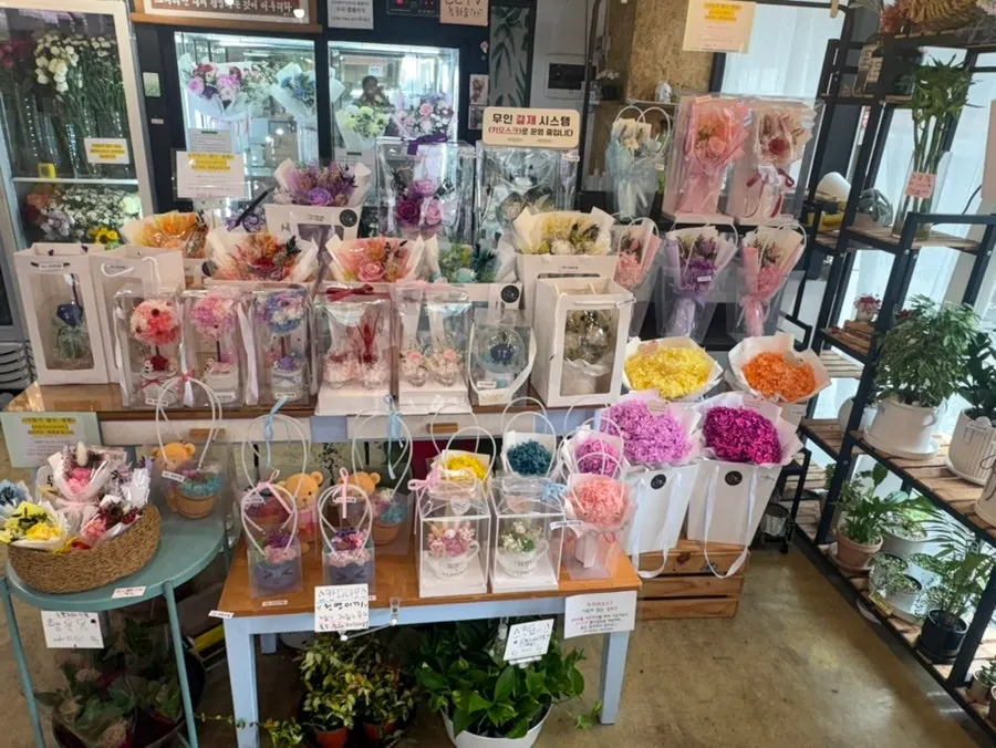 Preserved flower bouquets displayed near the entrance