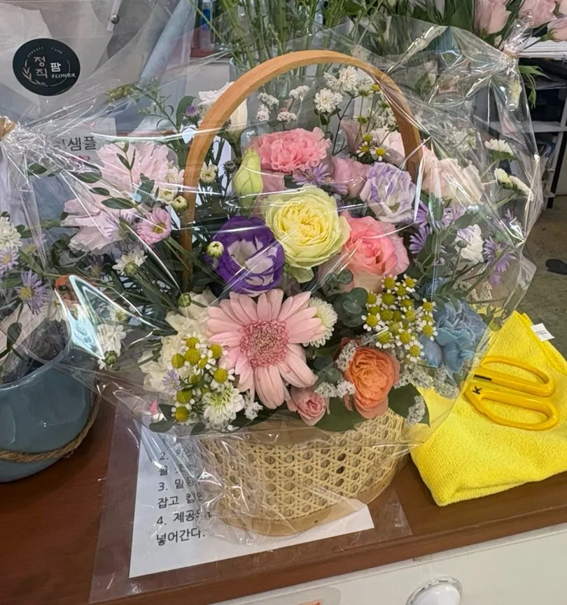 Lush, bright flower basket gift for grandmother