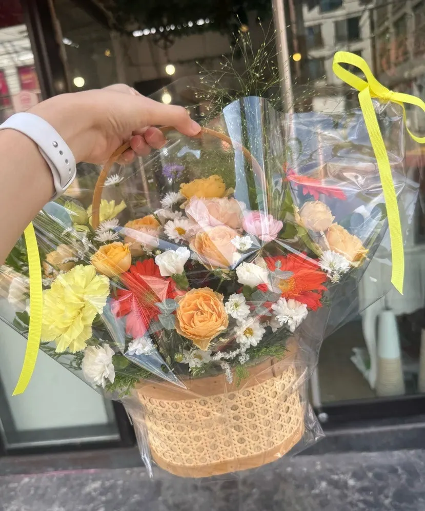 The finished and trimmed yellow flower basket ready to take home