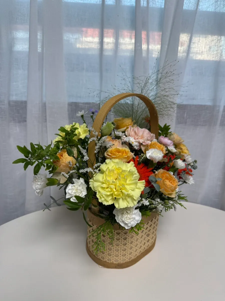 Flower basket showing the yellow ribbon accent